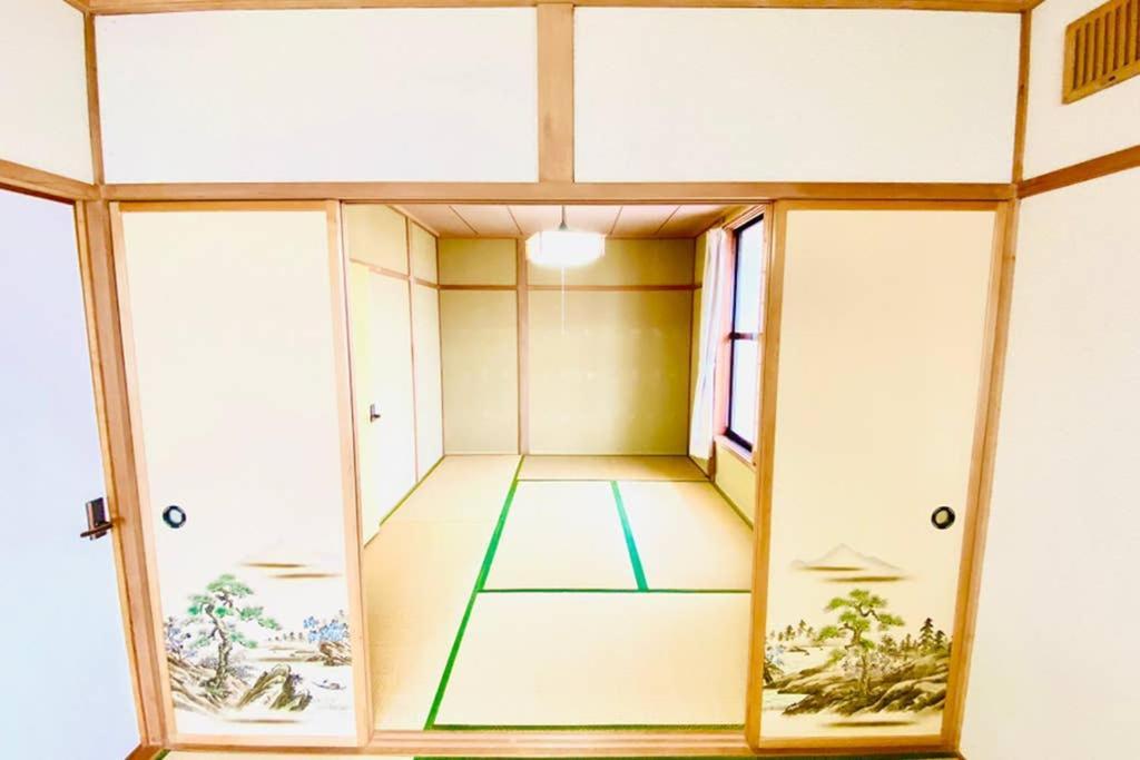 Вилла Manyi'S Onsen House 天然温泉マンイの湯 Сираои Экстерьер фото