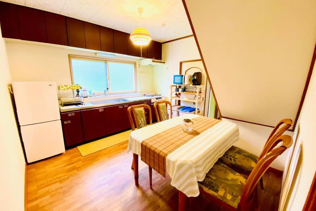 Вилла Manyi'S Onsen House 天然温泉マンイの湯 Сираои Экстерьер фото